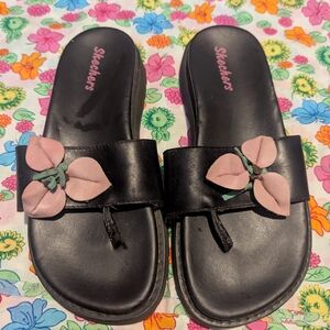 Skechers Black Slide Sandals with Pink Flower Accent